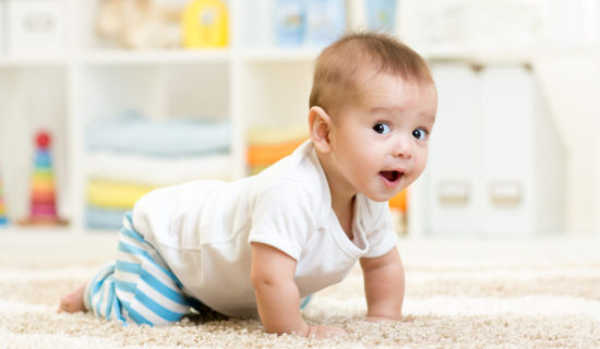 A toddler crawling on the floor
