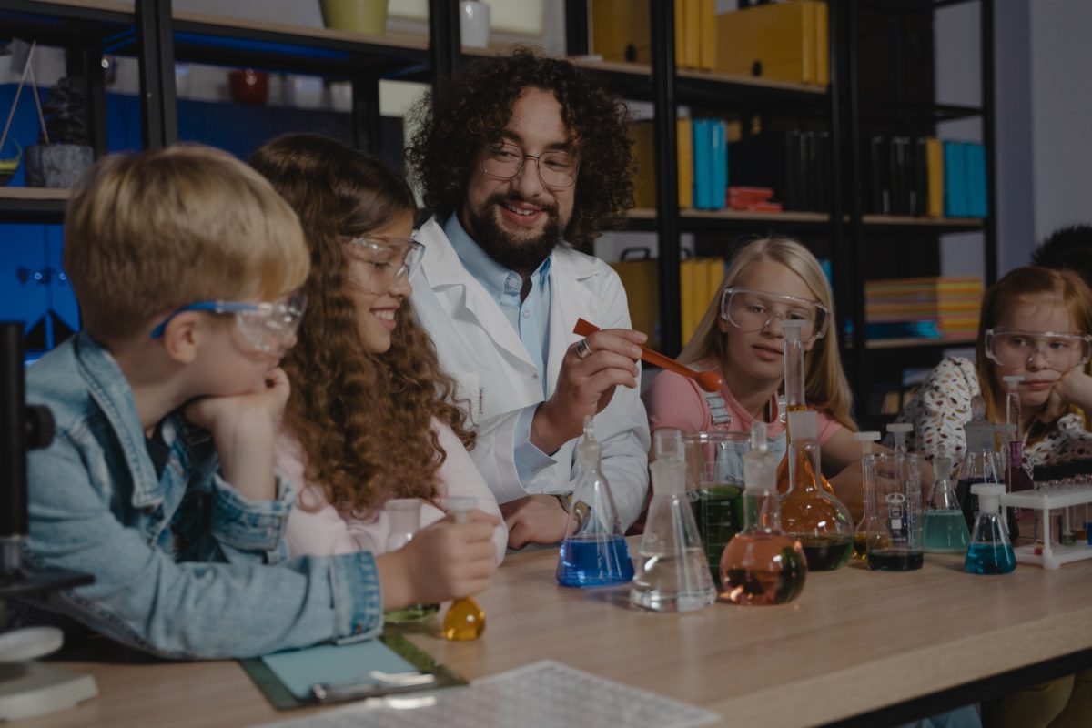 A science teacher with students