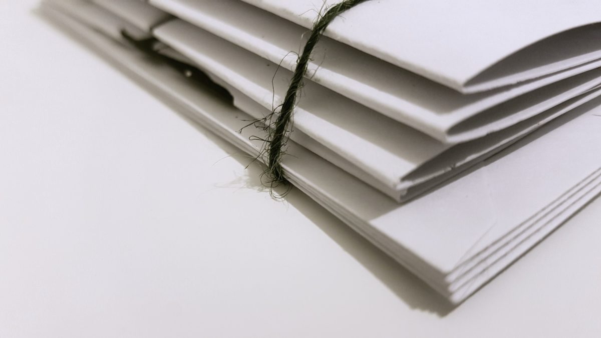 A pile of white folders