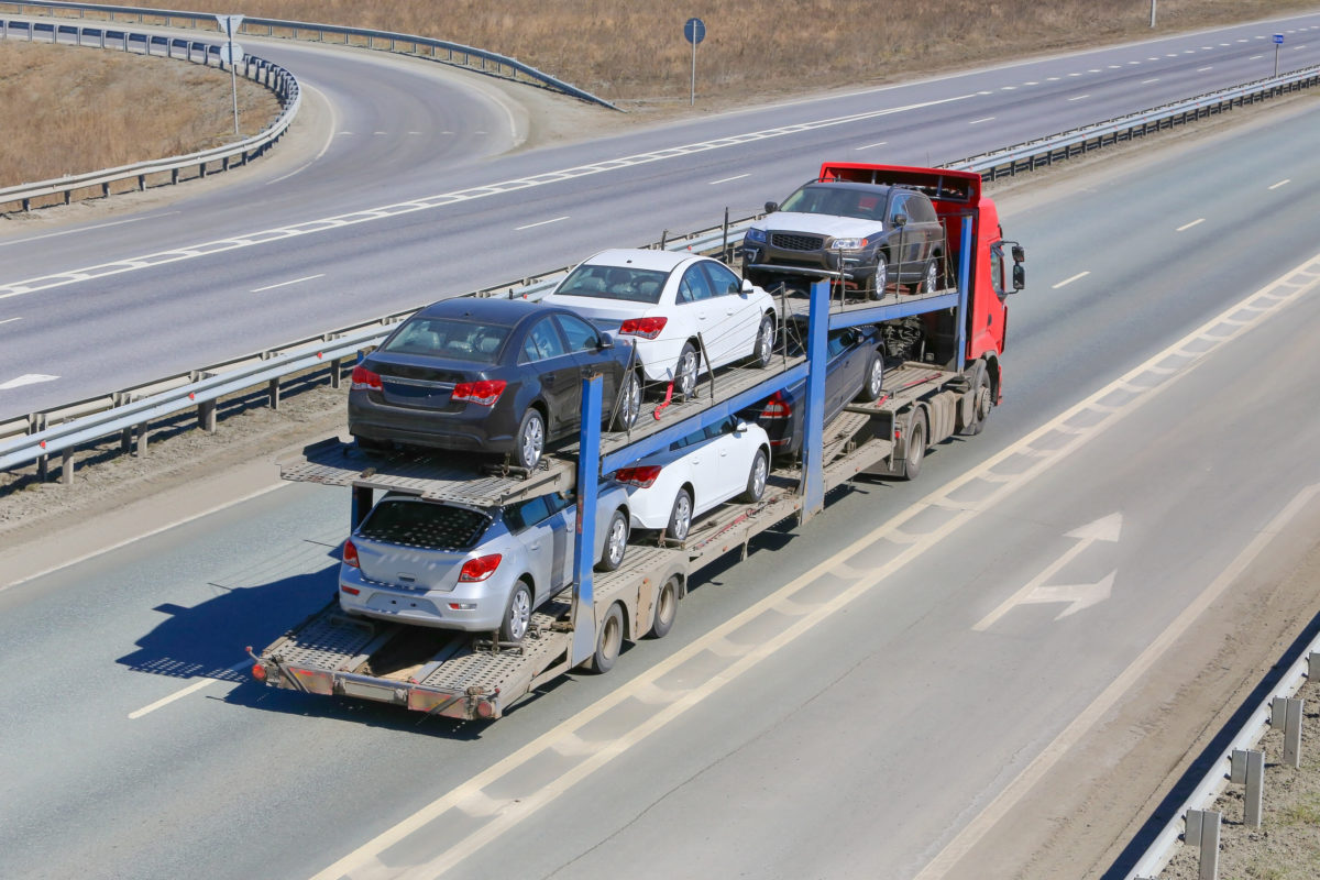 An open trailer auto transport