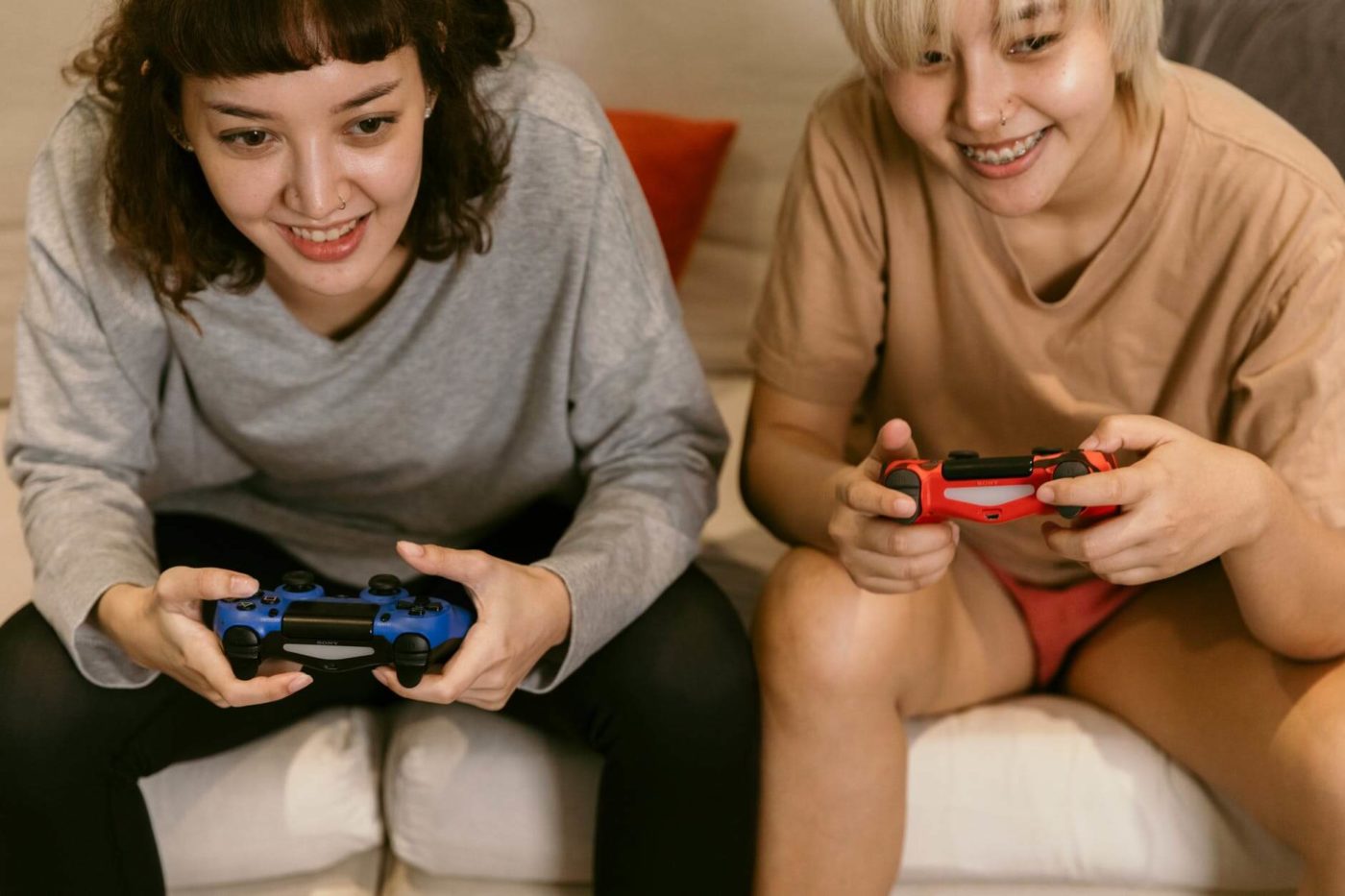 Girls relaxing and playing video games