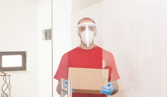 Professional mover in covid protective gear