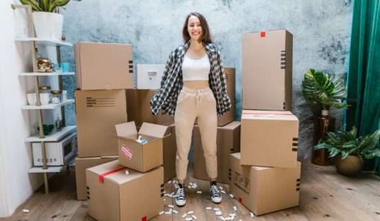 A young woman with a pile of packages