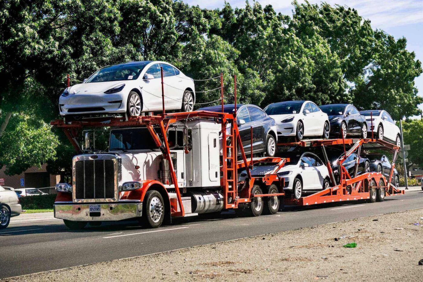A USA auto transport truck filled with cars