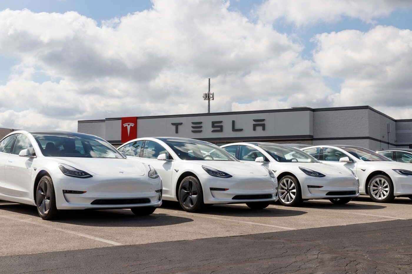 Indianapolis - Circa September 2019: Tesla electric vehicles awaiting preparation for sale. Tesla EV Model 3, S and X are a key to a cleaner and greener environment XI