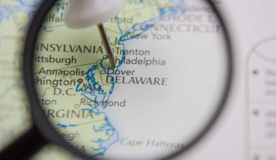 American state Delaware on the map of the world or atlas.