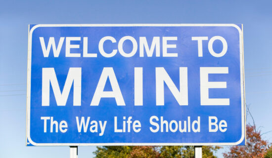 A sign saying Welcome to Maine